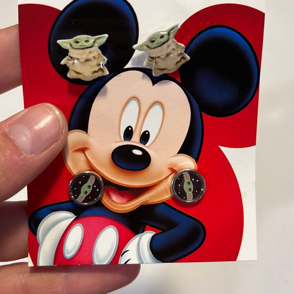 Two pair baby yoda earrings with backings.